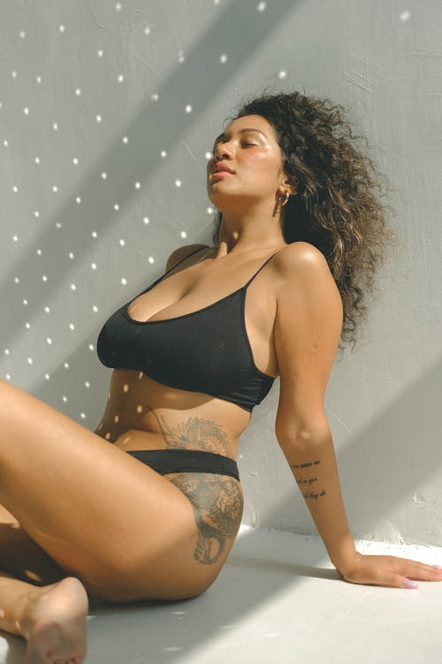 Free Tattooed Woman in Black Underwear Stock Photo