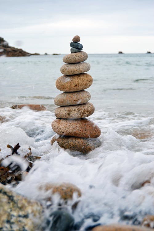 A Stacked of Rocks on the Beach
