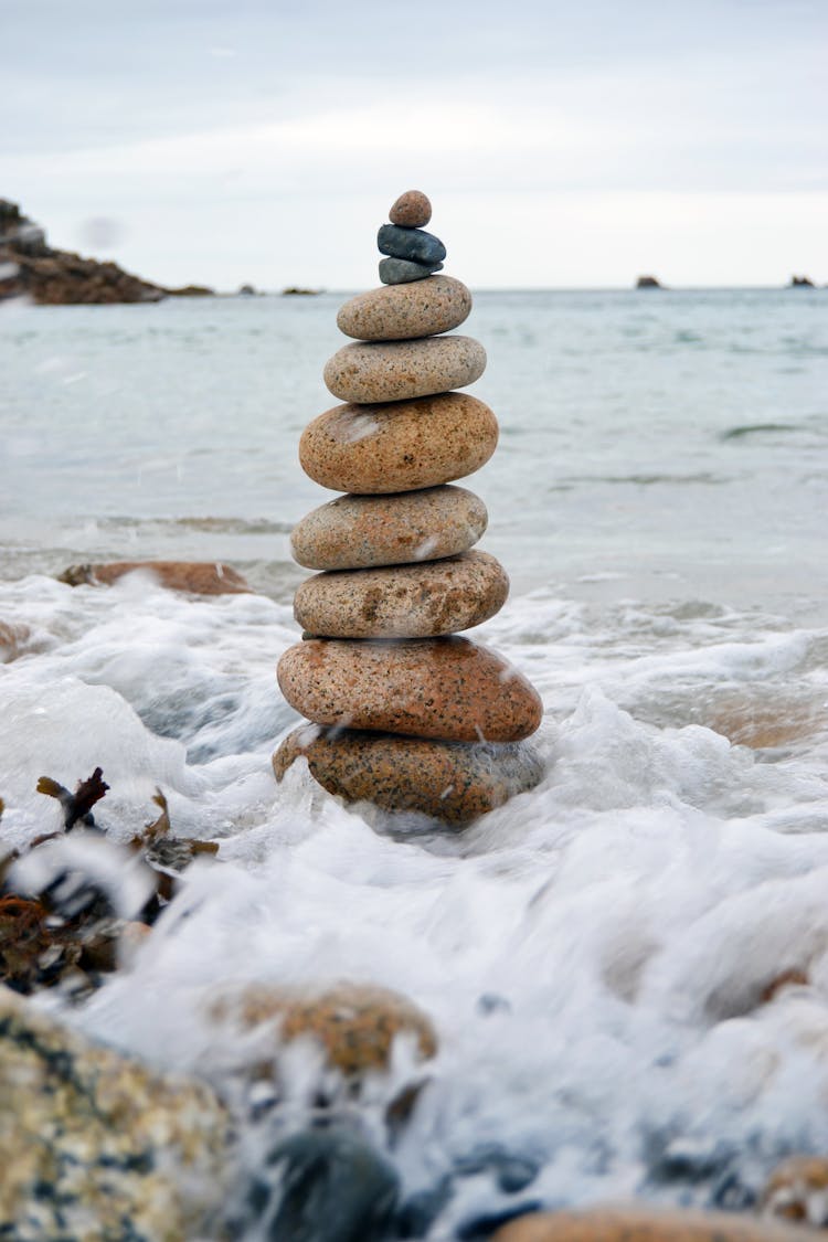 A Stacked Of Rocks On The Beach