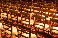 Empty Wooden Chairs in a Church