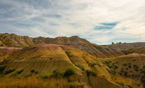 Free Beautiful view of Badlands National Park's geological formations under a clear blue sky in South Dakota. Stock Photo