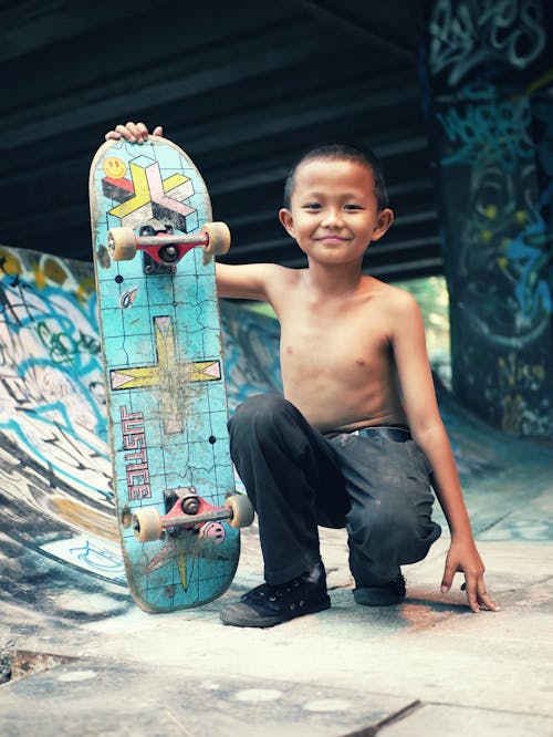 Kostenloses Stock Foto zu asiatischer junge, junge, lächeln