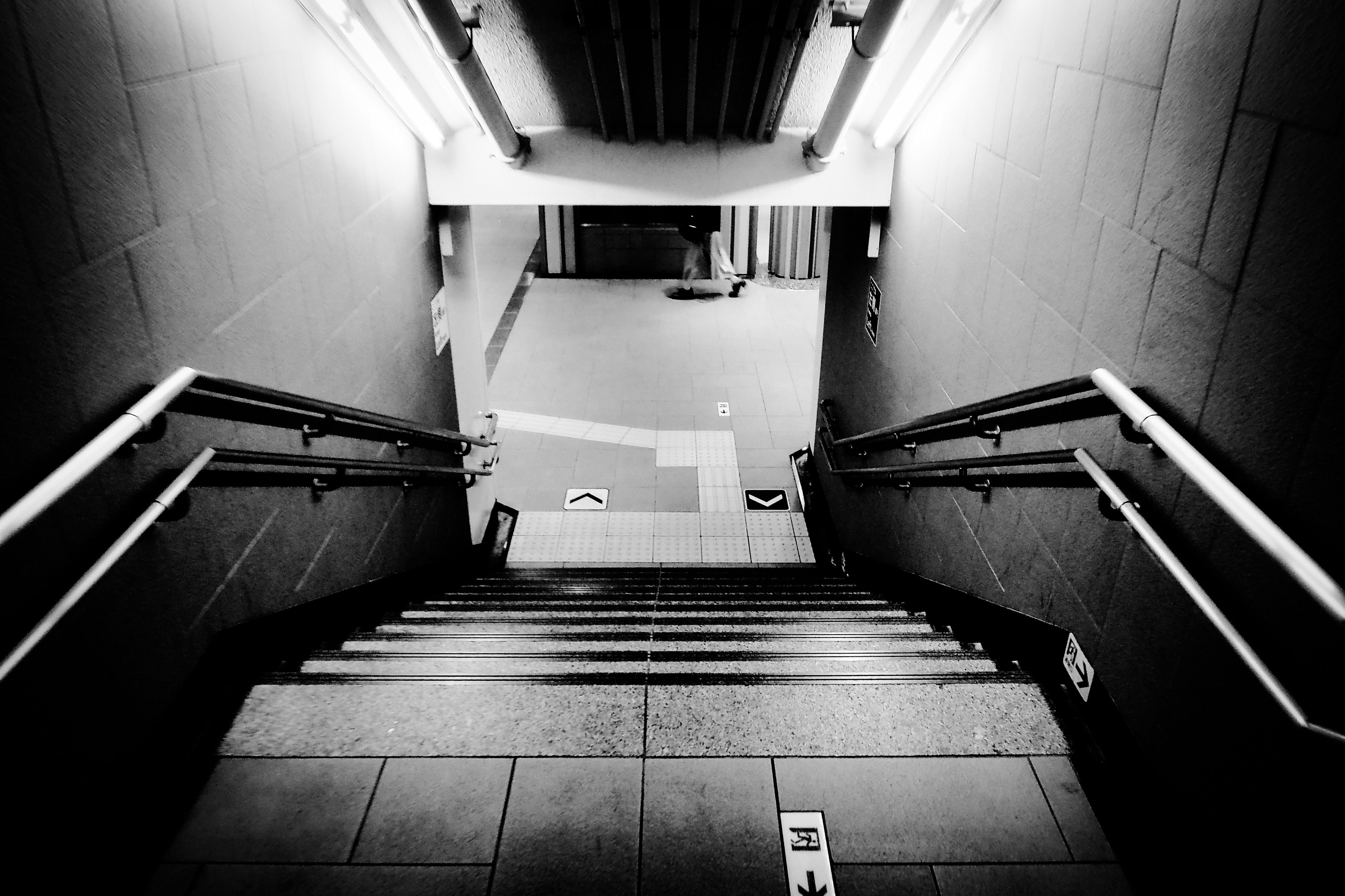 Busy entrance to a Tokyo subway station in Japan with commuters