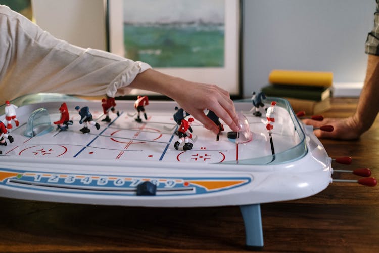 A Person Playing Table Hockey