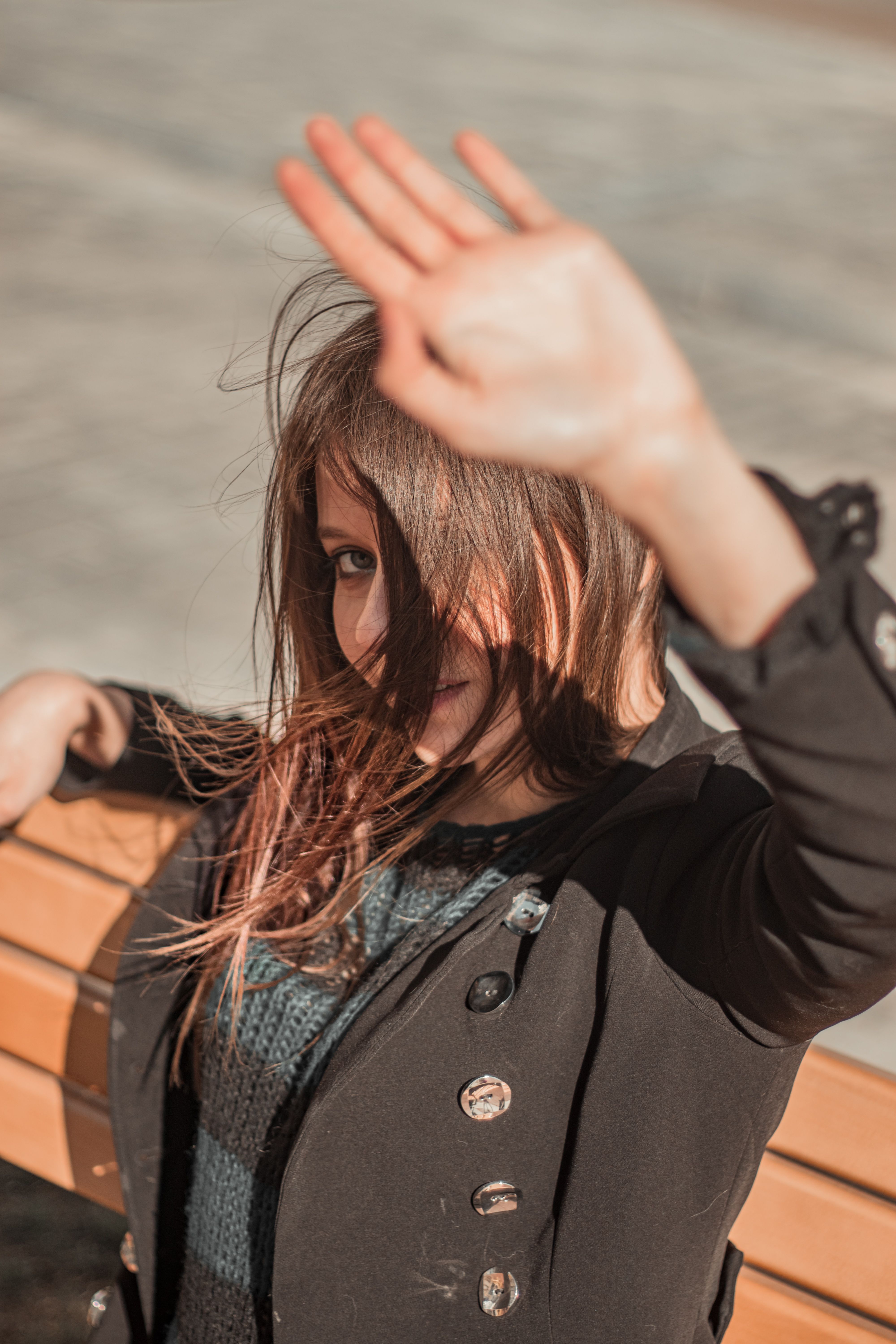 Woman in Black Jacket Standing near Brown Trees · Free Stock Photo