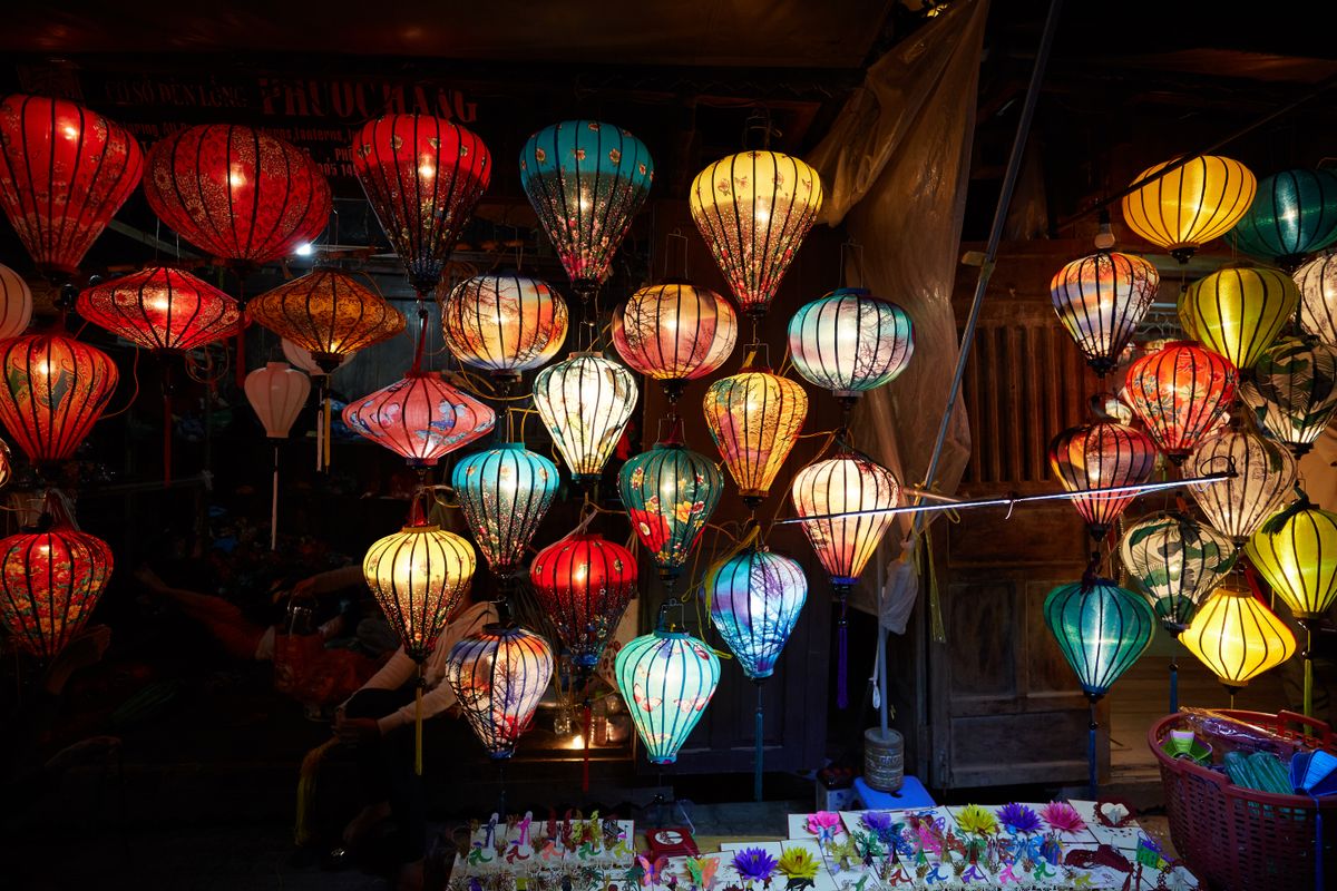 Hội An's silk lanterns strung above the old town — a UNESCO World Heritage trading port unlike anywhere else in Vietnam.