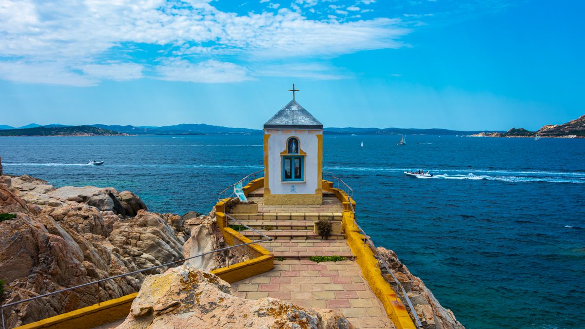Hilltop chapel above the sea on the Sardinian coast