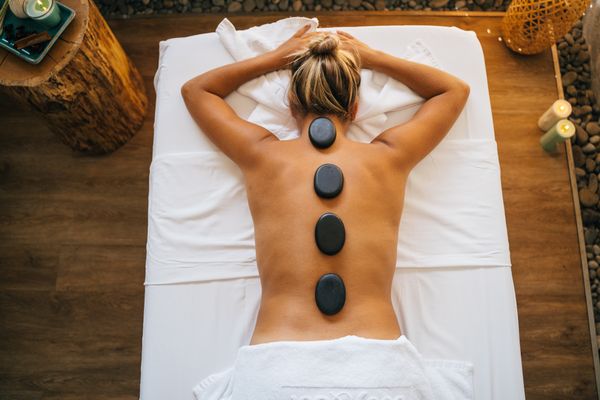 Hot stone massage in a tranquil spa