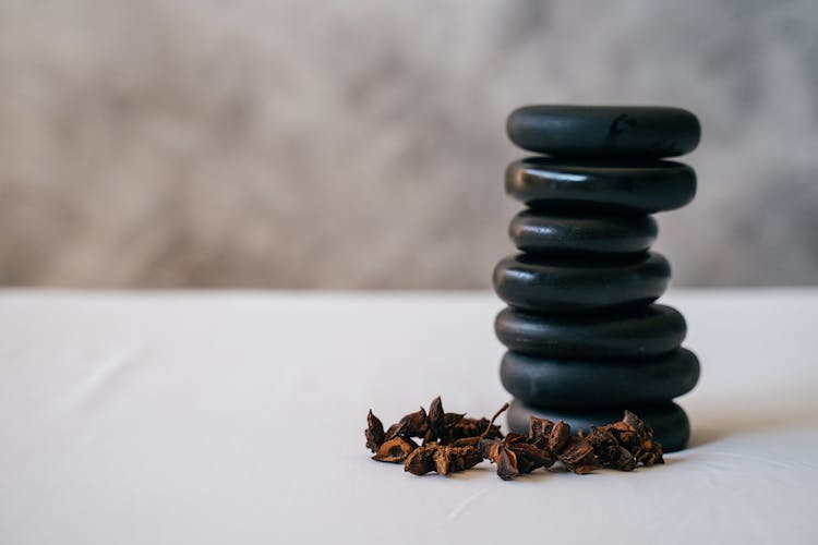 Stacking Stones Beside Star Anise 