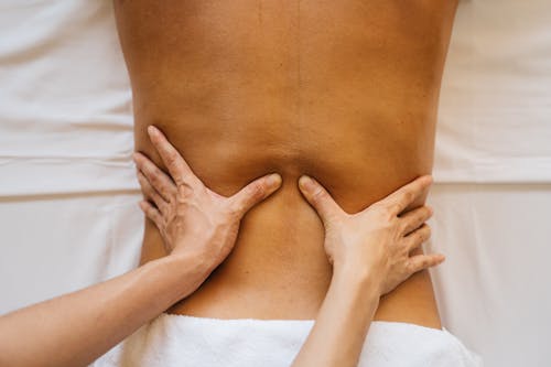 Topless Woman Having a Massage