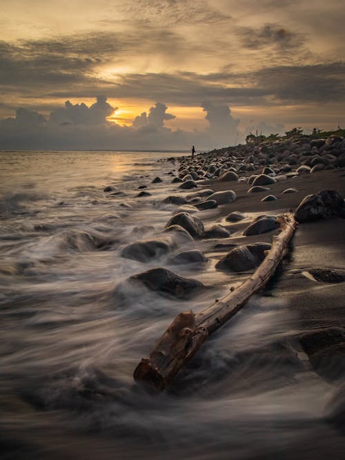 Foto profissional grátis de areia, cênico, céu nublado