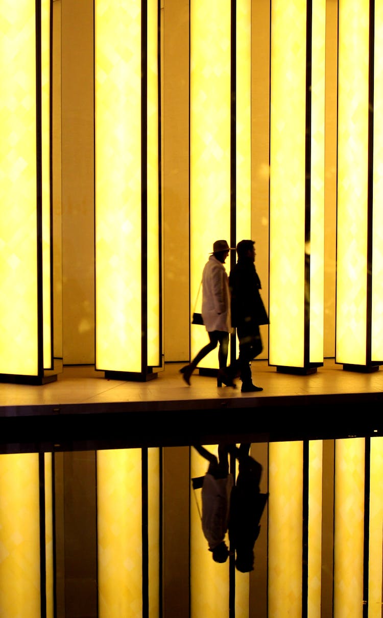 People Walking Inside The Louis Vuitton Foundation In Paris