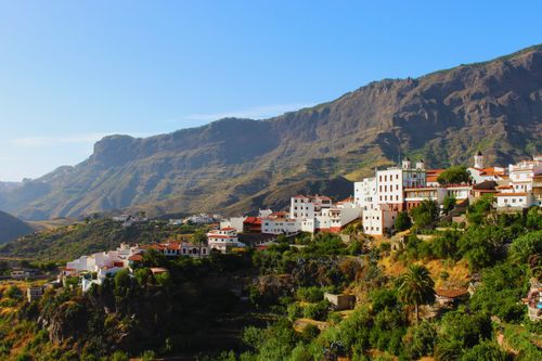 Free Picturesque Spanish village nestled among mountains in a rural setting, perfect for travel imagery. Stock Photo