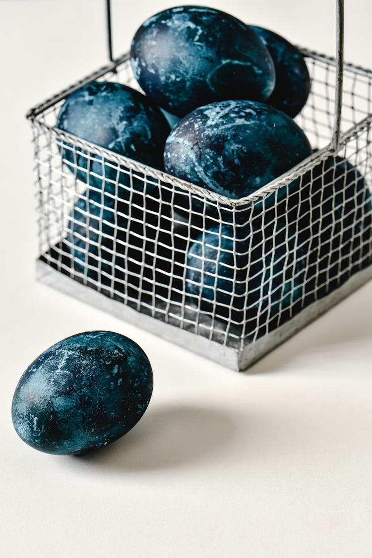 Stacked Eggs On A Metal Basket