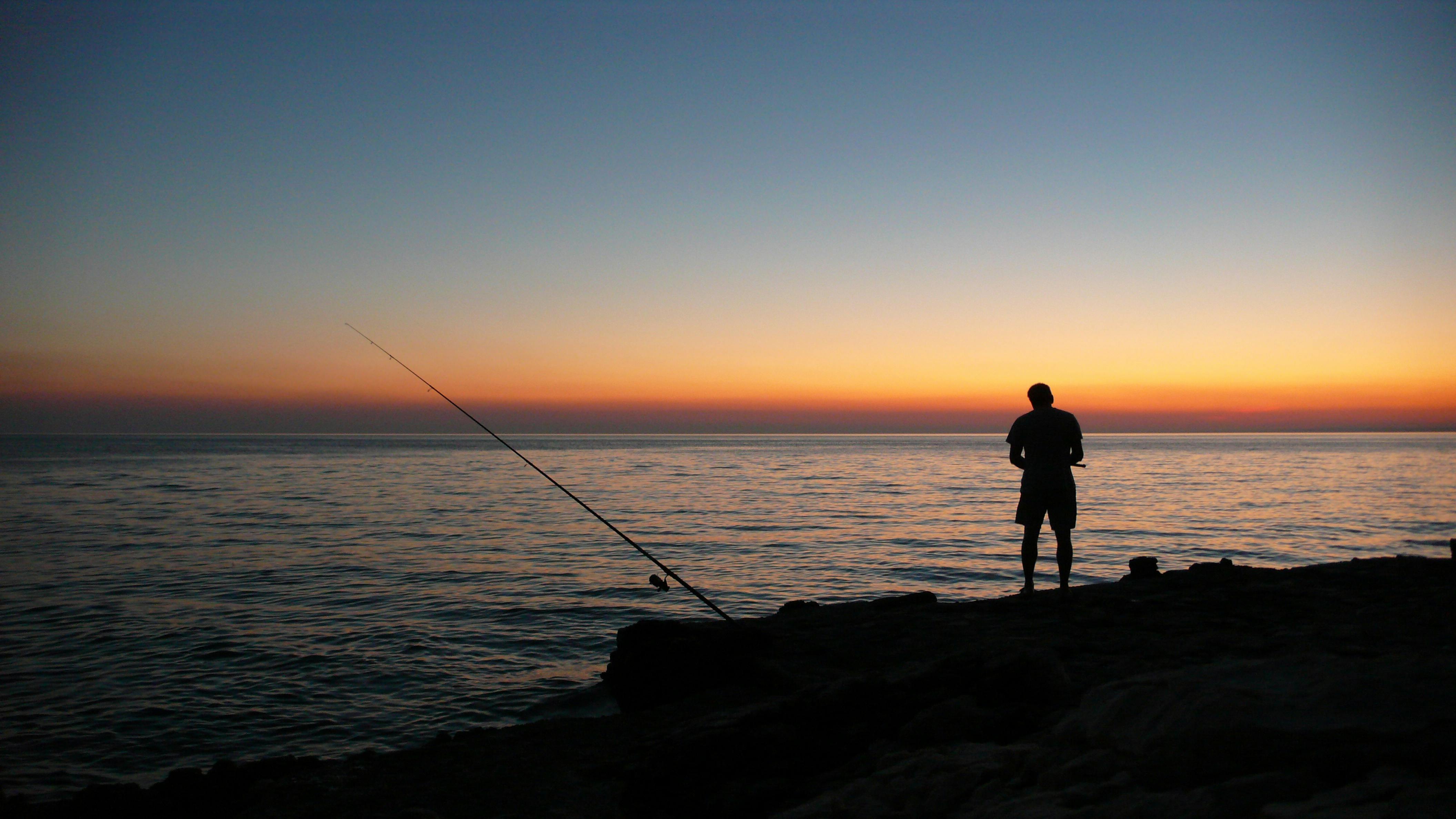 Person Fishing during Sunset · Free Stock Photo