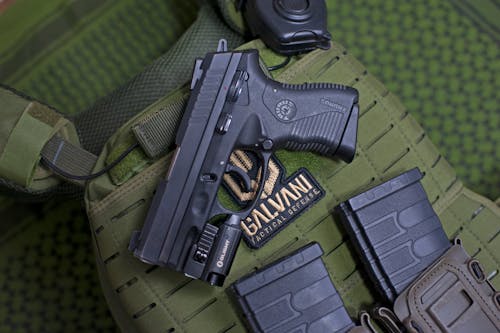 Close-up of a Military Vest with Guns 