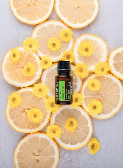 Free Lemon Slices and Essential Oil Stock Photo