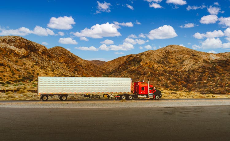 Red Semi Truck On The Road