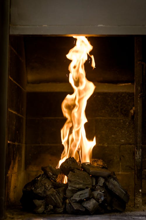 Free Burning Charcoals in Fireplace Stock Photo