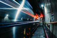 Vehicles Traveling in a Tunnel in Time Lapse Photography