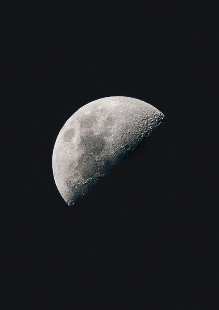 Third Quarter Moon In A Dark Night Sky