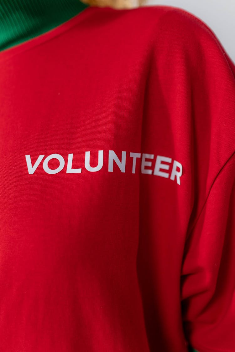 Volunteer Printed On A Red Shirt