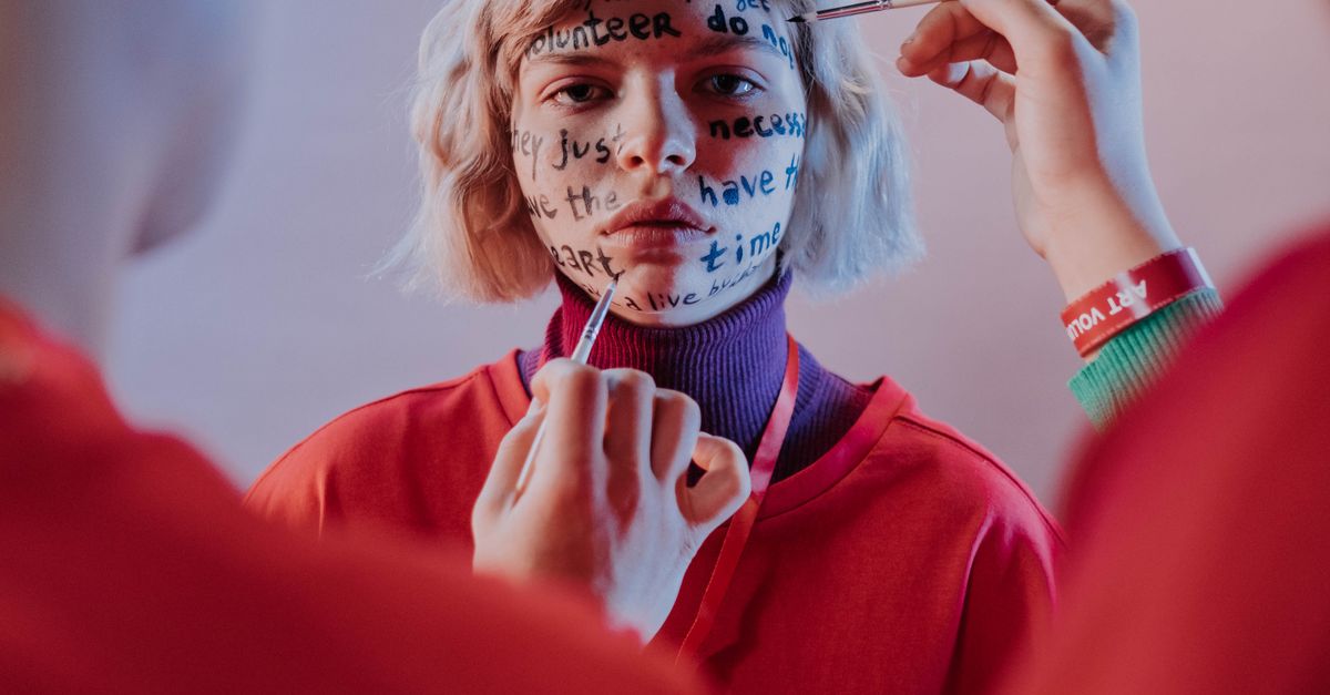 People Writing on a Woman's Face · Free Stock Photo