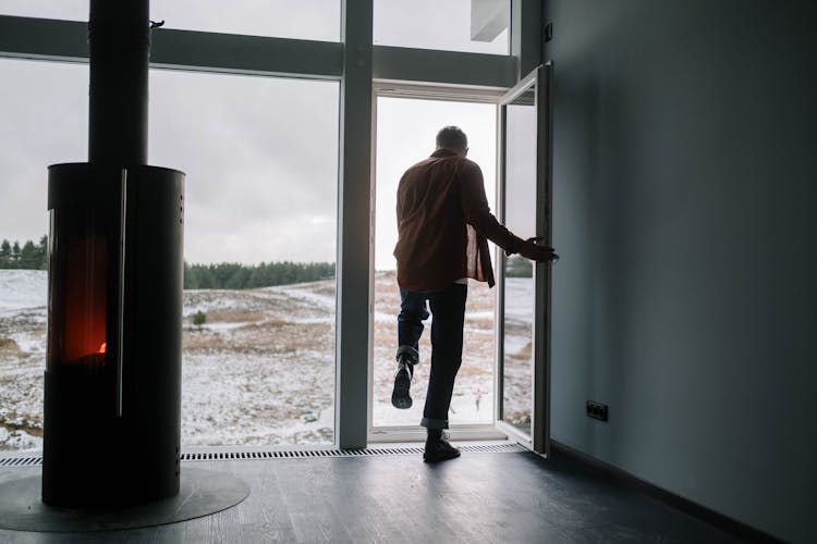 Man Walking Out The Door