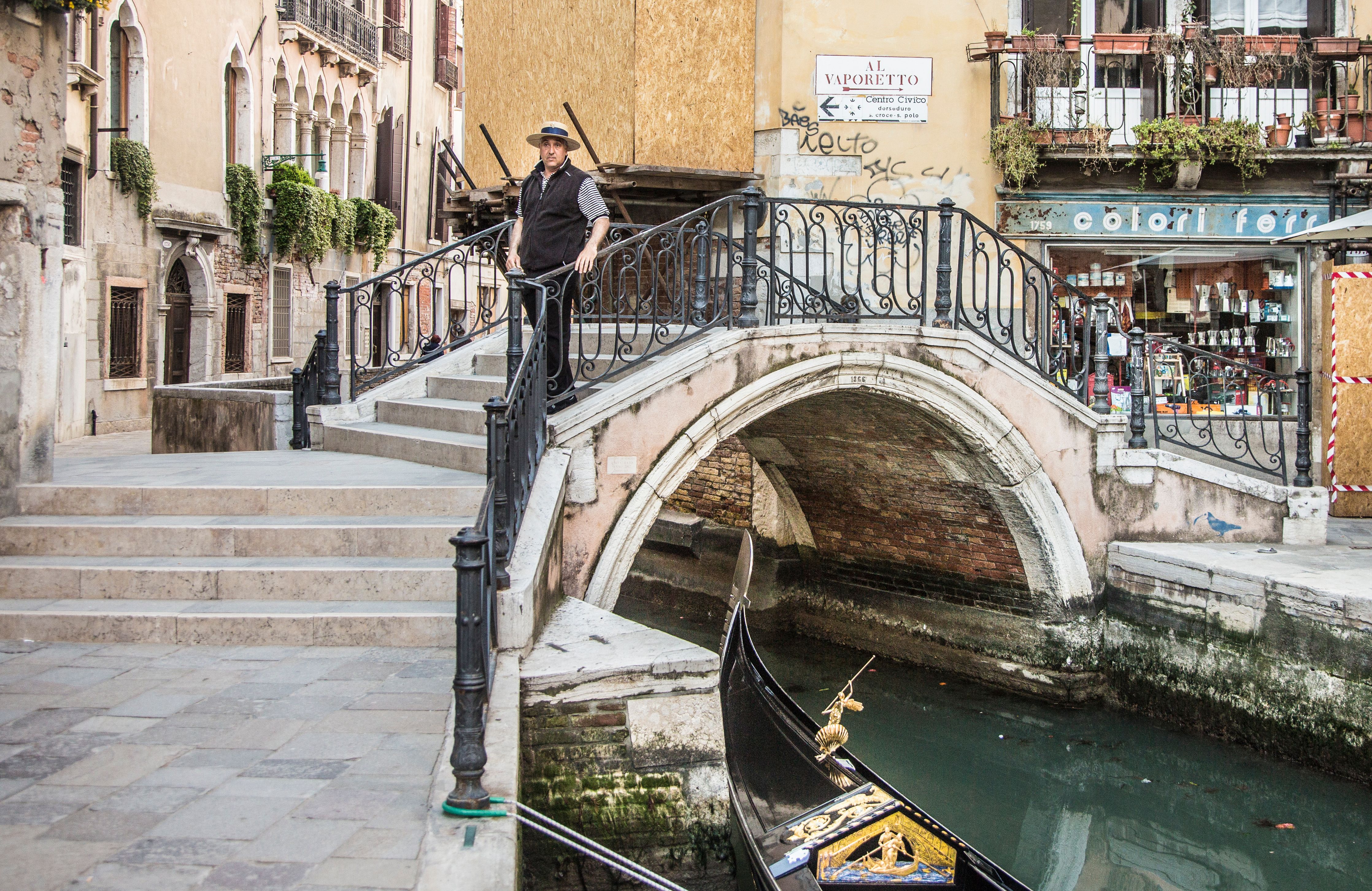 Man Standing on a Bridge · Free Stock Photo