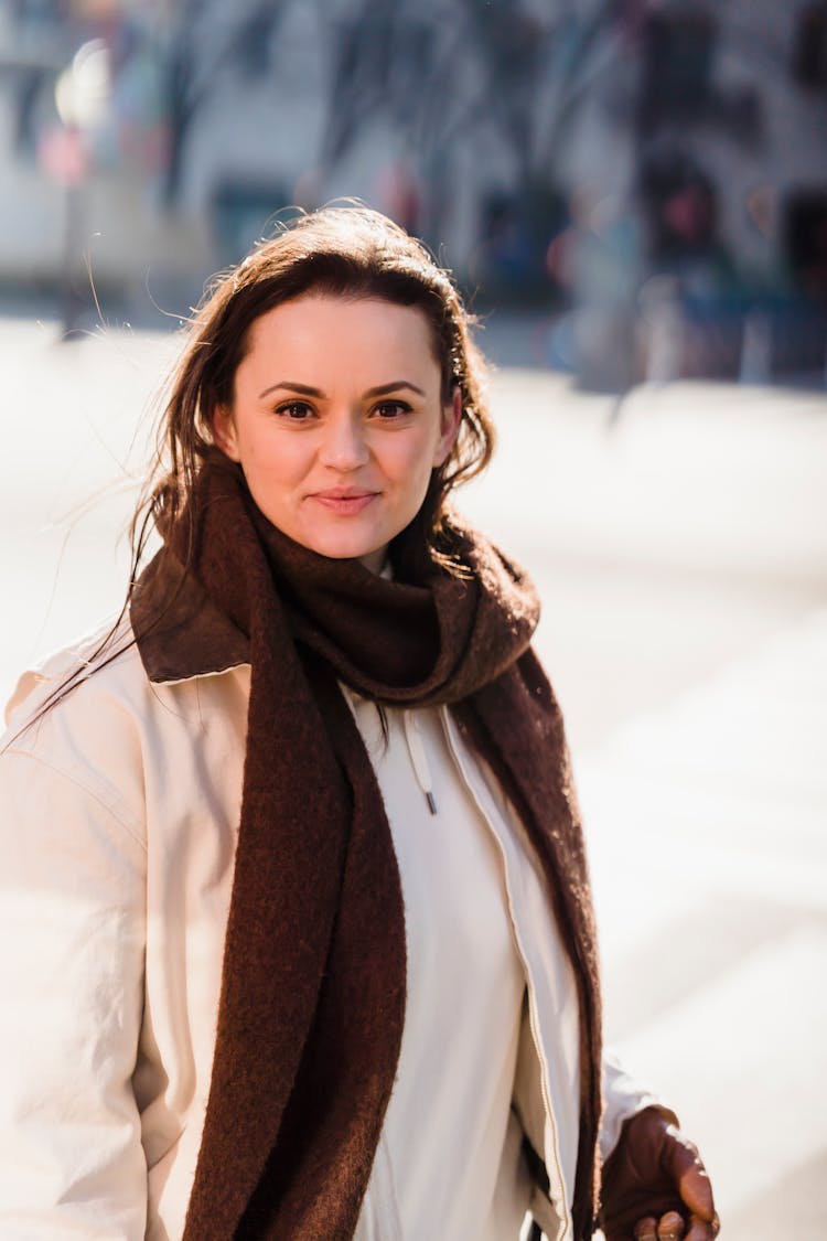 Happy Woman In Trendy Woolen Scarf Smiling