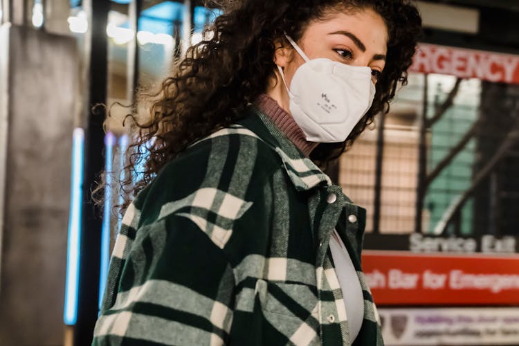 Lady In Mask In Subway Station