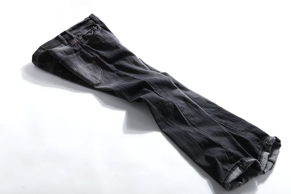 Black Denim Jeans on White Panel