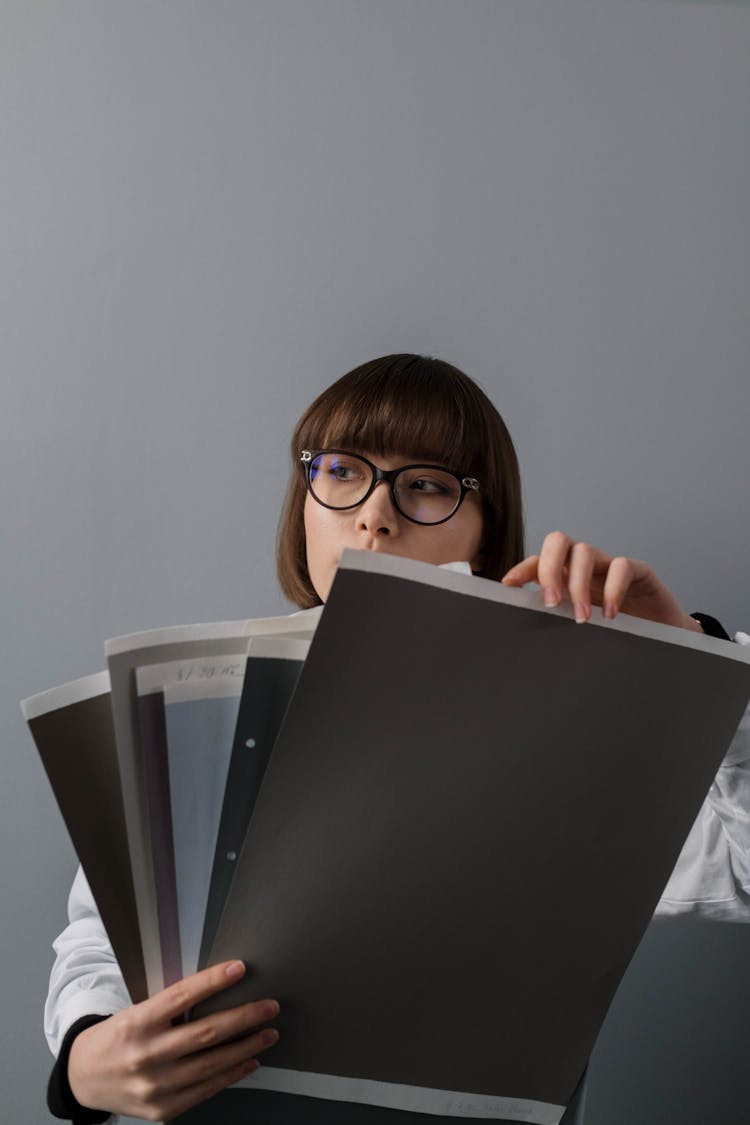 Woman Holding Samples 