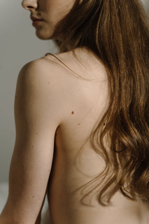 Close-Up Photo of Woman's Shoulder