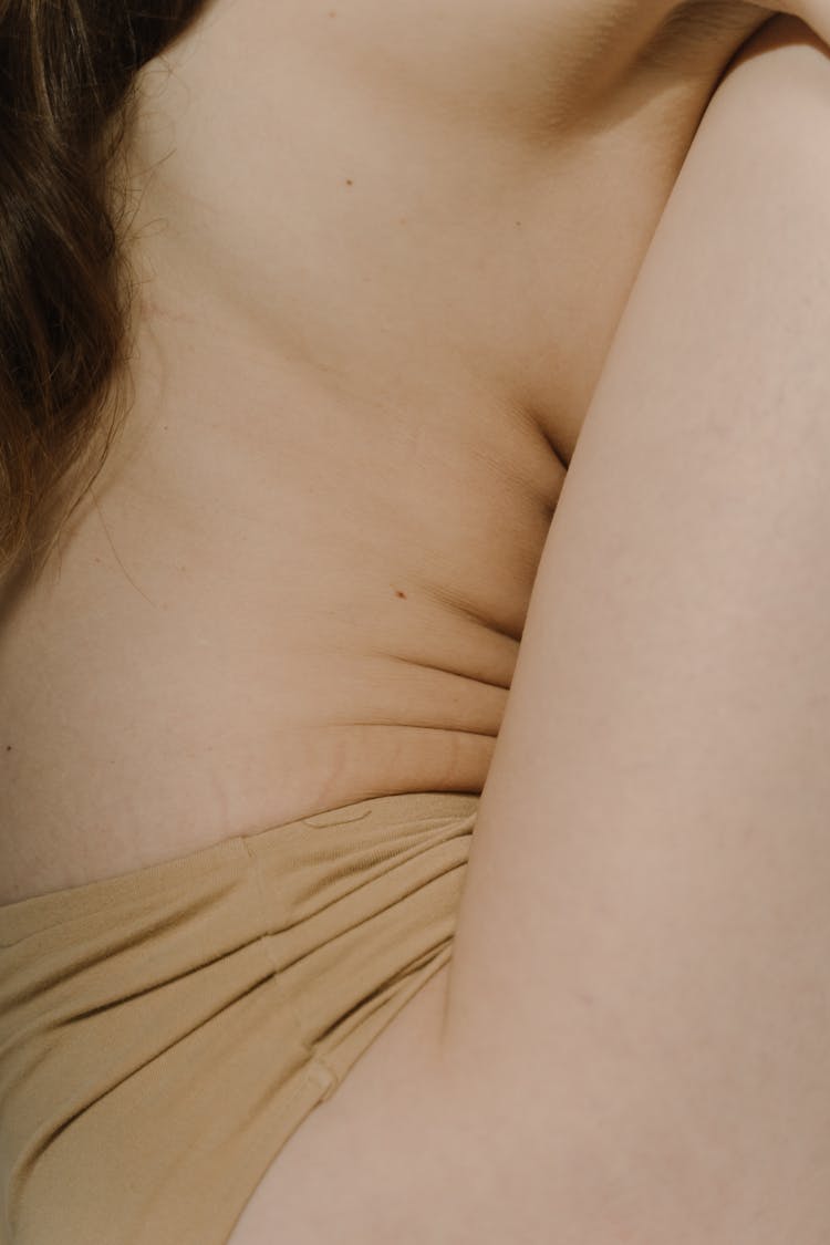 Close-up Photo Of Woman's Naked Torso 