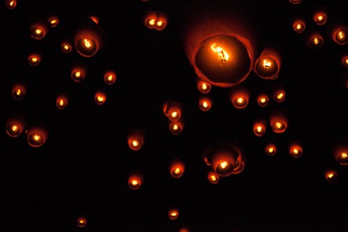 Sky Lanterns Floating on a Night Sky