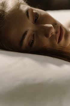 Close-up of a woman resting, conveying tranquility and calmness.
