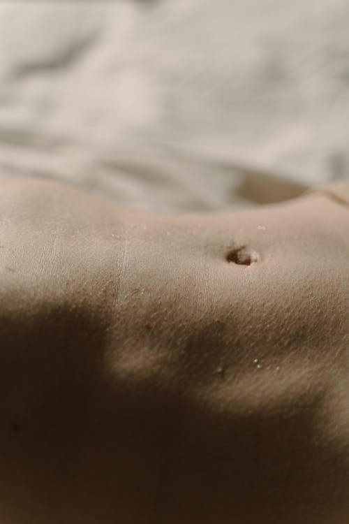 Kostnadsfri bild av hud, mage, naken