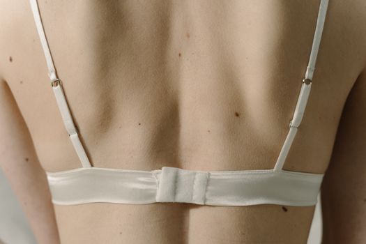 White Brassiere on Persons Body