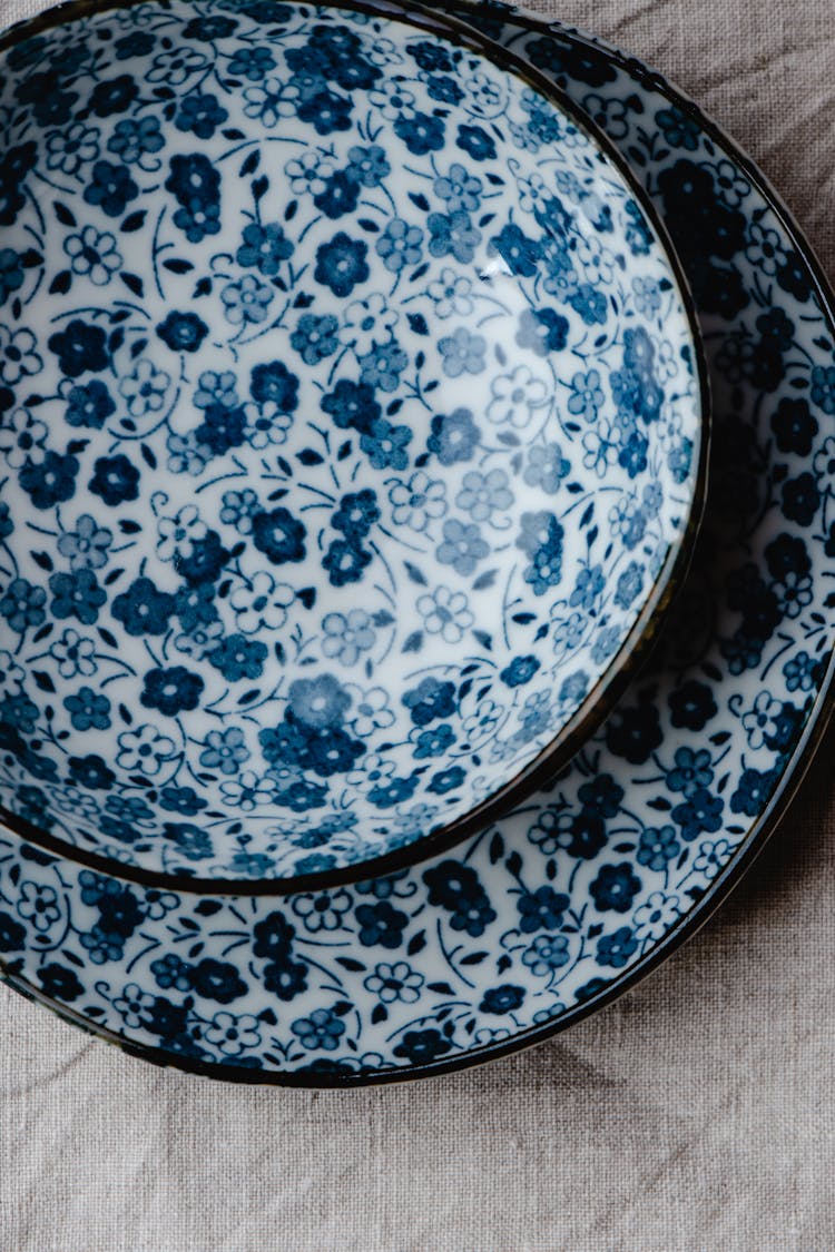 Floral Design On Ceramic Bowl And Plate