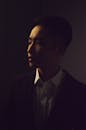 Dark Portrait of a Man in a Suit