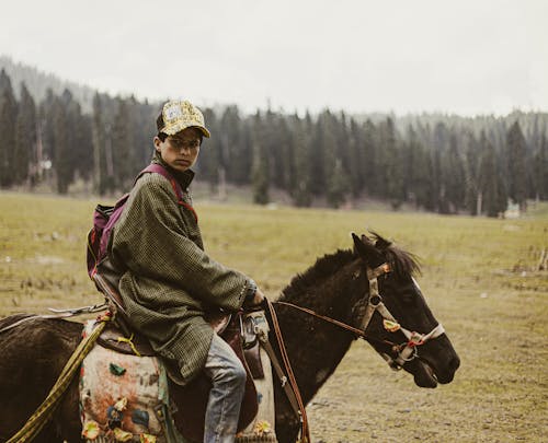 A Man Riding a Horse