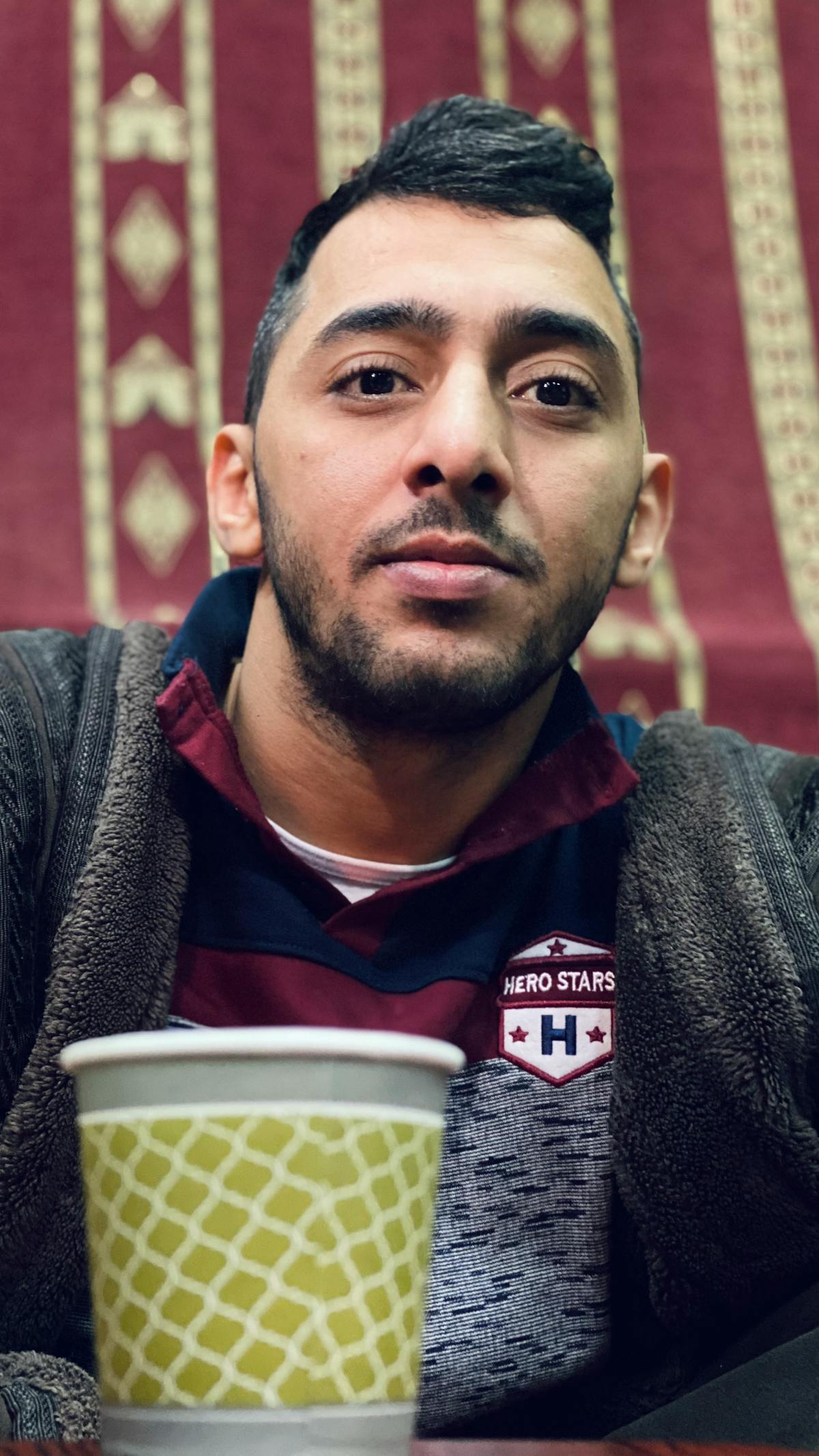 Minimalist living room with neutral tones, low-profile sofa, and clean lines