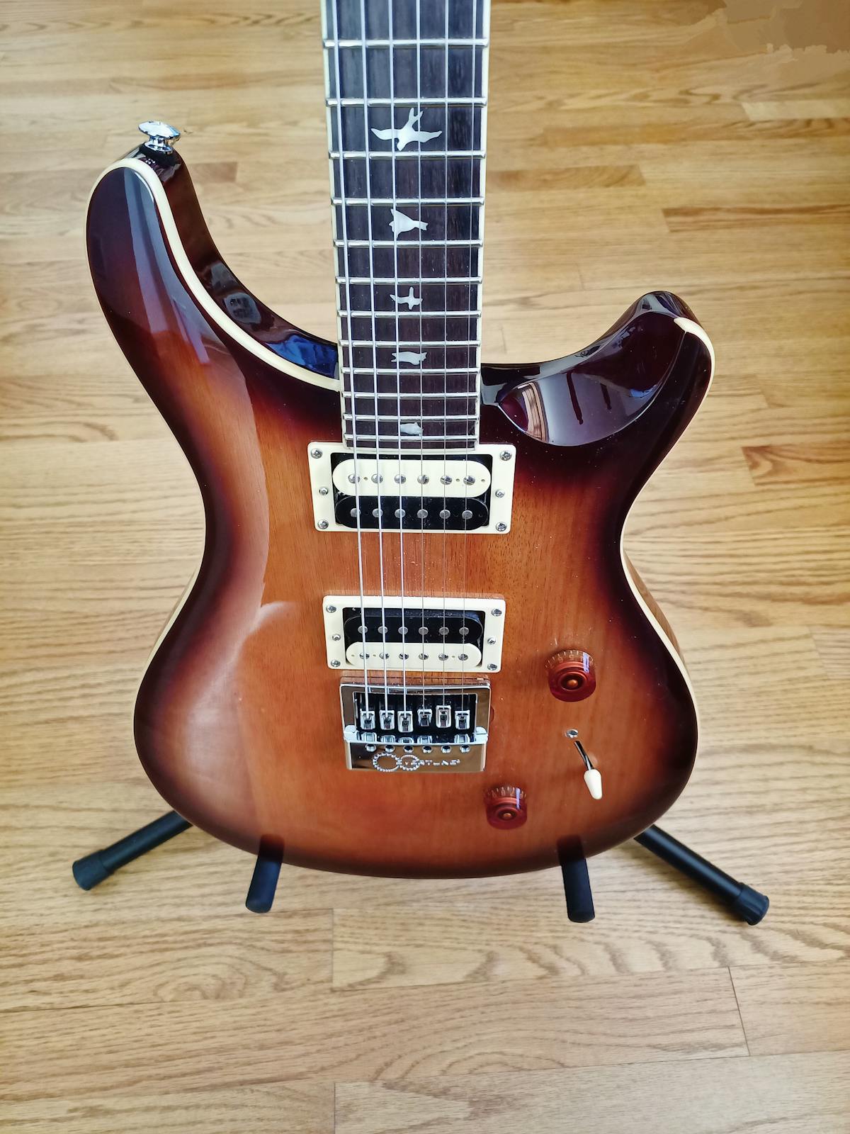 Cozy minimalist living room with neutral colors, soft textures, and light wood furniture