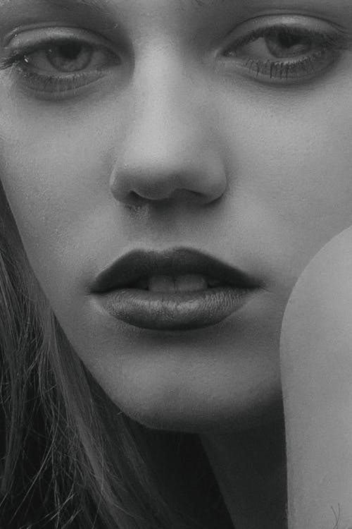 Grayscale Photo of a Woman's Face 