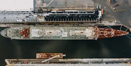 Huge cargo ship near industrial dock