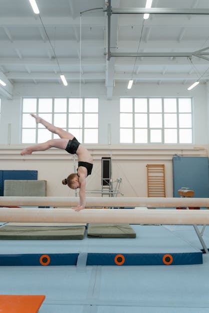 gymnastics beam handstand
