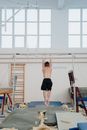 Man Hanging on Horizontal Bar