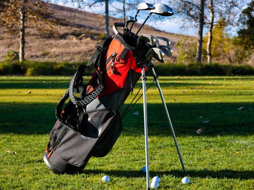 Free Red and Black Golf Bag on Grass Stock Photo