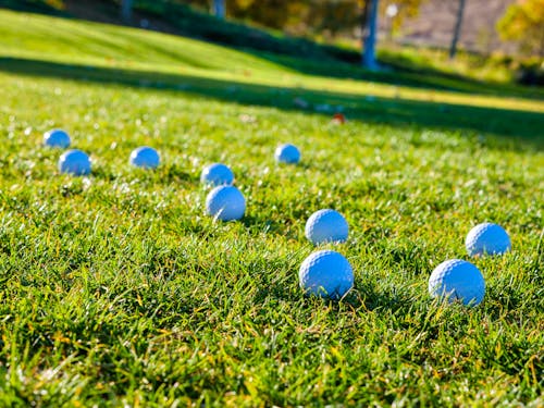 Gratis stockfoto met golfballen, gras, sportbenodigdheden